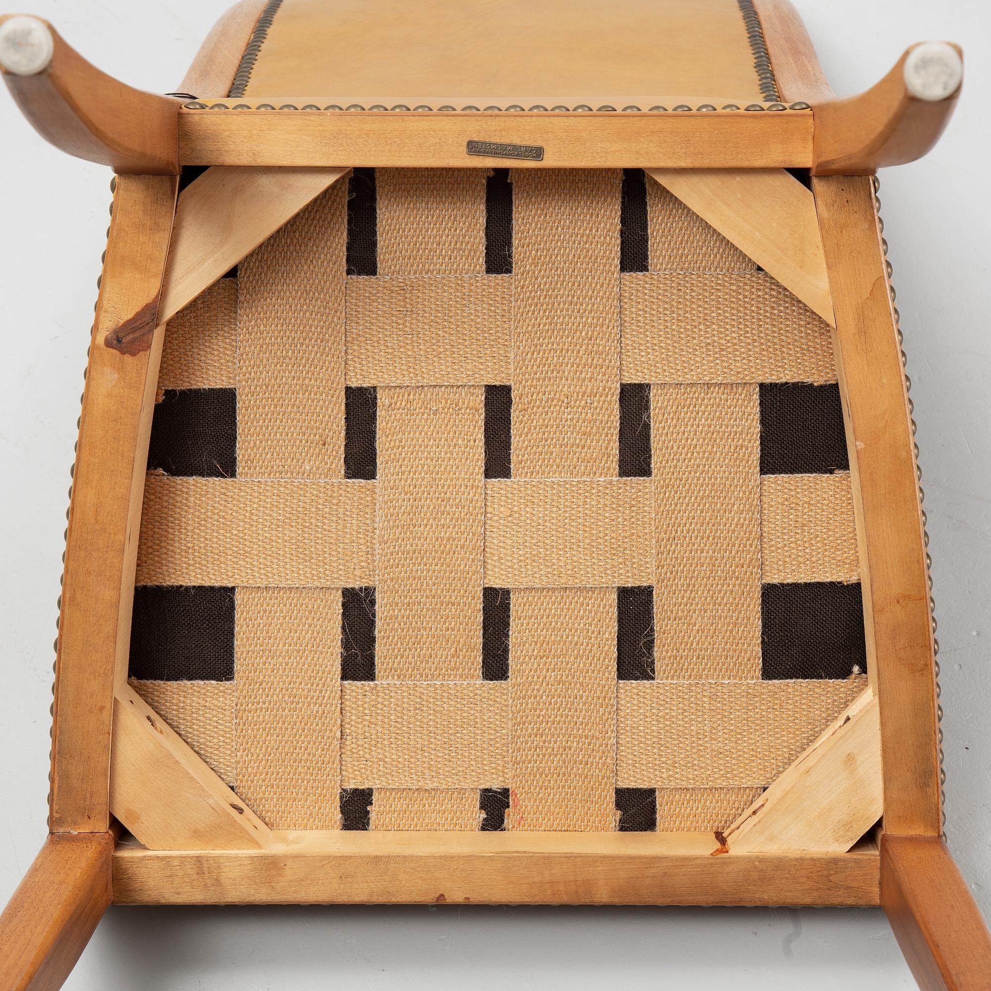 Carl Malmsten, a set of twelve, mahogany and leather chairs. Åfors Möbelfabrik.