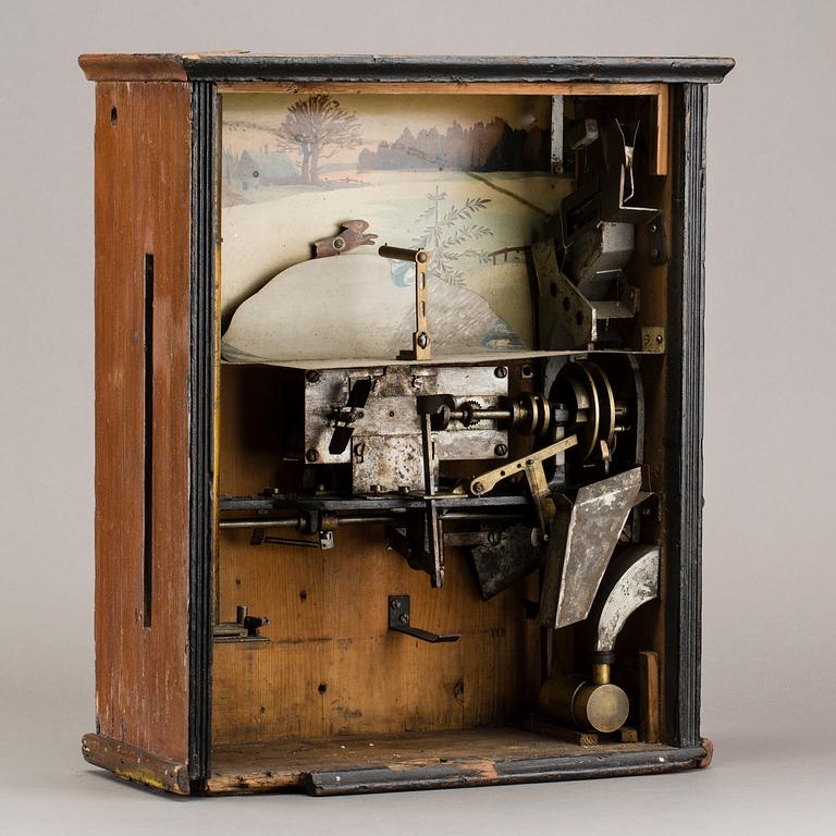 AMUSEMENT MACHINE, early 20th century.