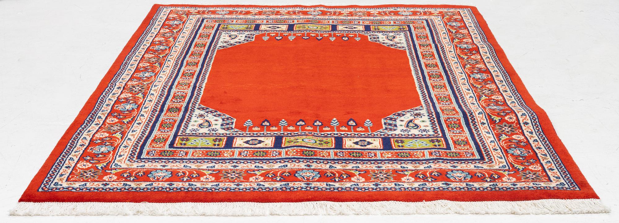 A Kashmar carpet, c. 236 x 168 cm.