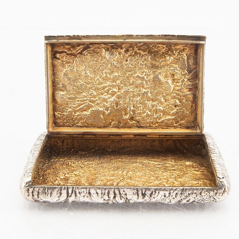 A Russian silver box with samorodok decoration and guilded inside, around 1900.