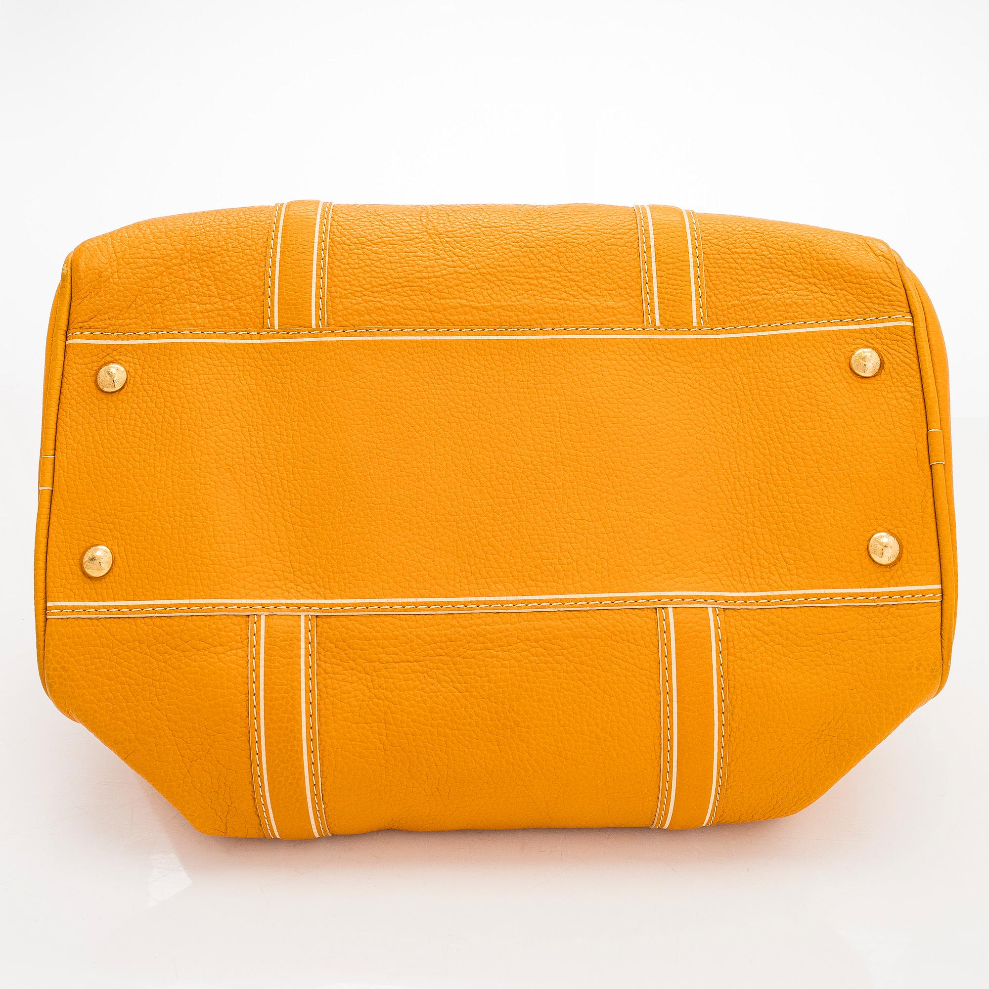 Louis Vuitton, a 'Tobago Carryall' bag.