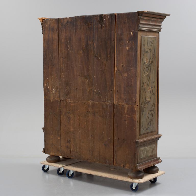 a painted cabinet, partly 18th century.