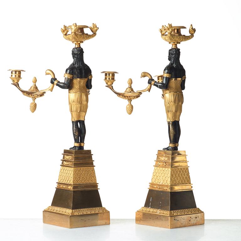 A pair of Empire three-light candelabra, circa 1810.