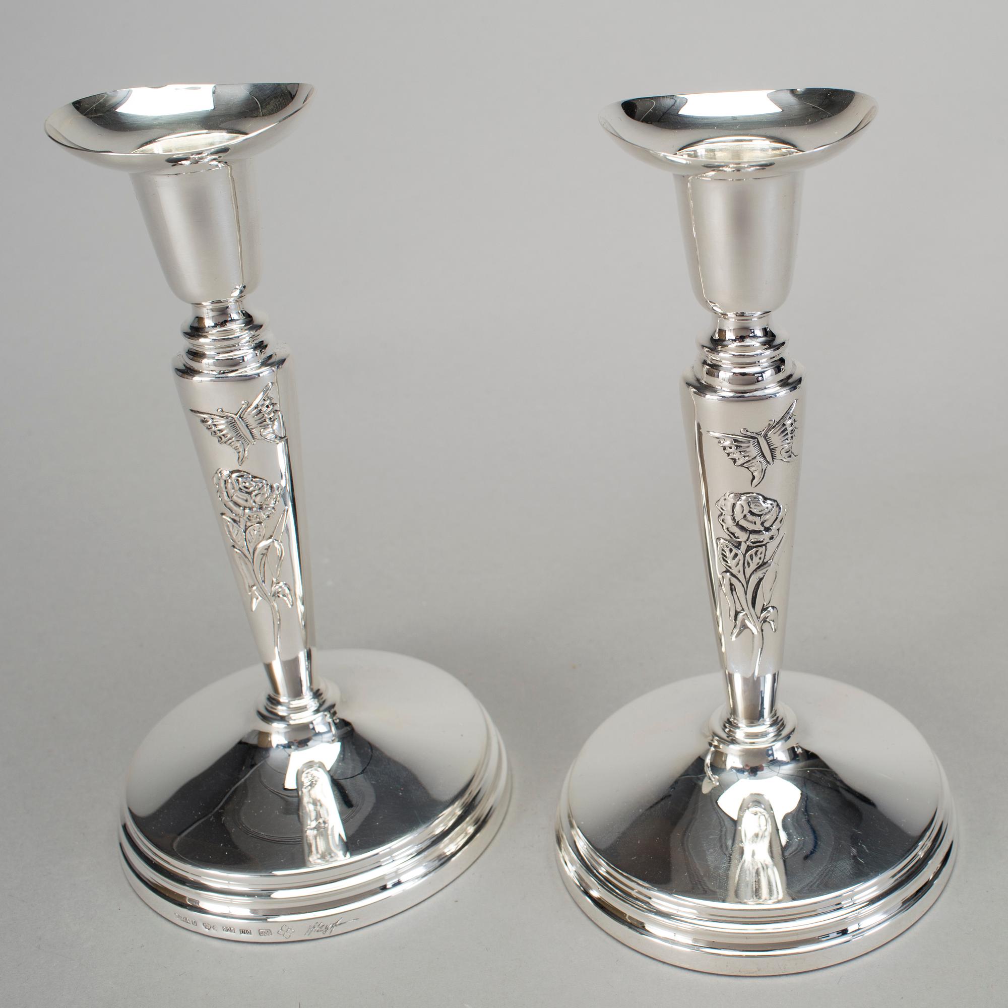 A pair of silver candlesticks by Meya Lerible for Mema, Linköping 1994.
