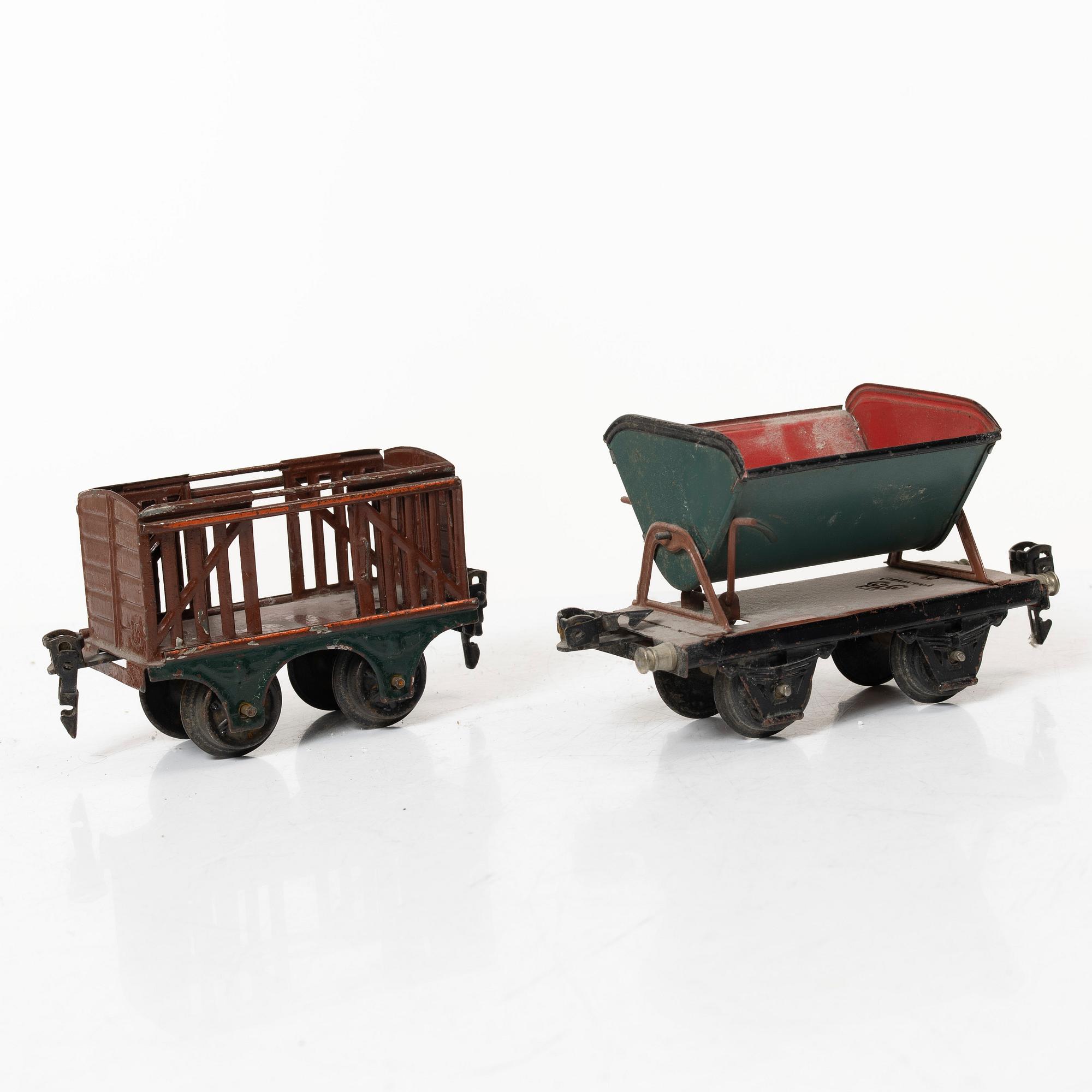 Model train with track and station building, 13 pieces, Germany, 1920s.