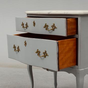A Rococo style chest of drawers, second half of the 20th century.
