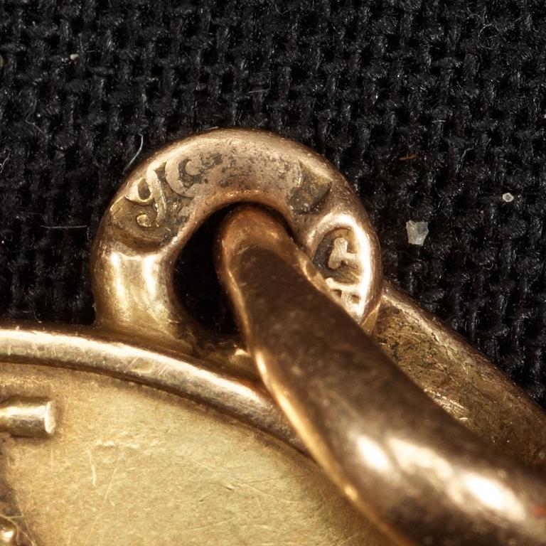 A Russian 20th century gold jetong, makers mark of Alfred Thielemann, FABERGÉ, St. Petersburg 1908-1917.