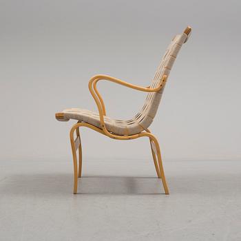 A ' Eva' easy chair by Bruno Mathsson for Firma Karl Mathsson.