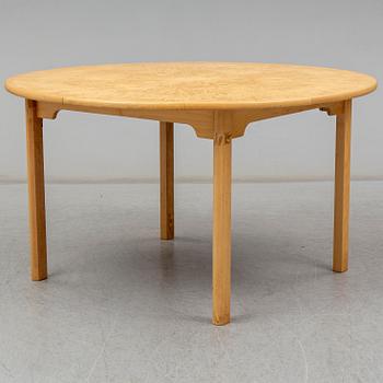 a 'Svitjod' dining table by Göran Malmvall for Karl Andersson & söner.