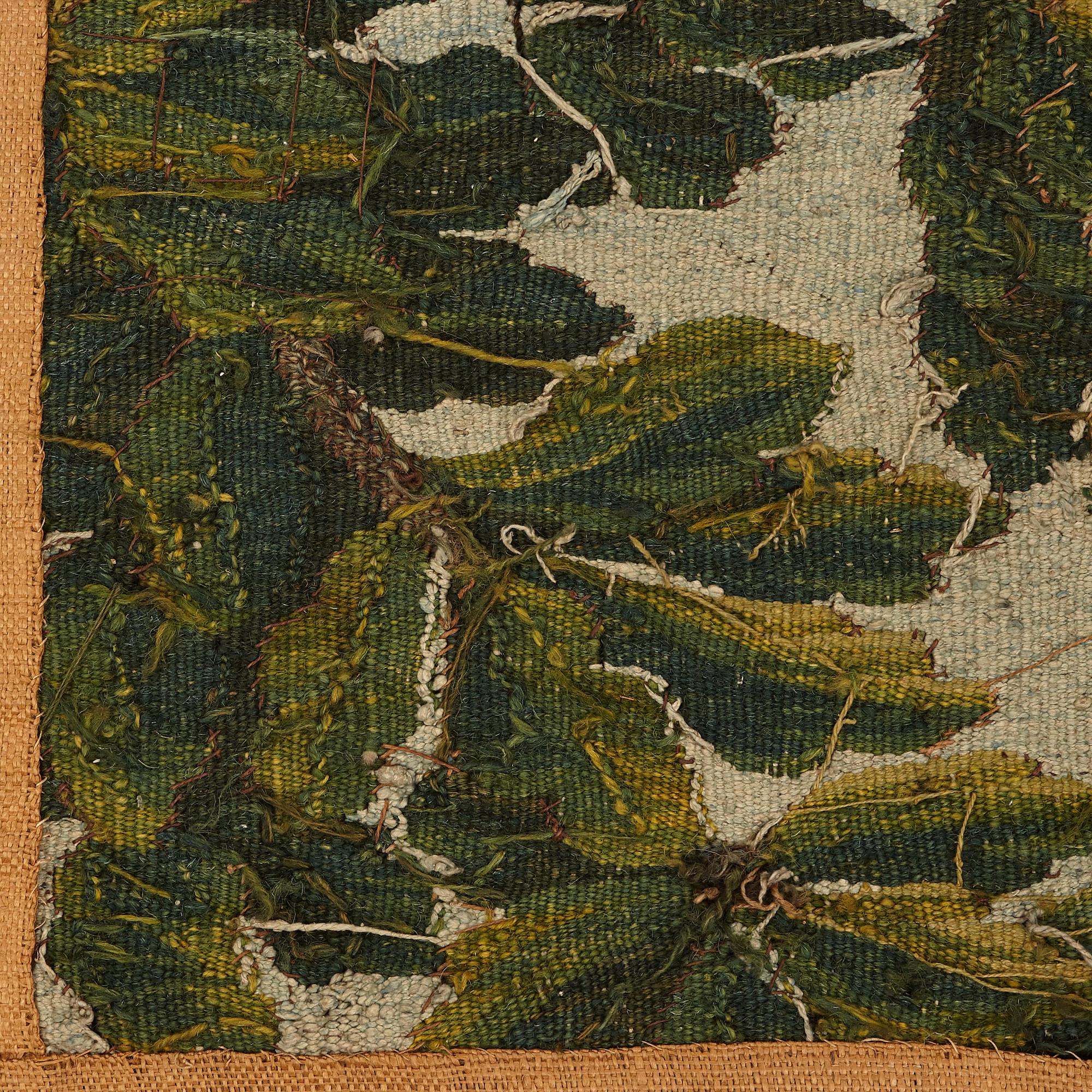 A "Verdure" tapestry, c 279 x 196 cm, signed M.R.D'AVBVSSONj.DVMONTEIL.