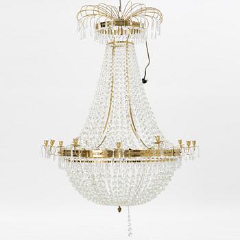 An contemporary empire style chandelier for 12 candles.