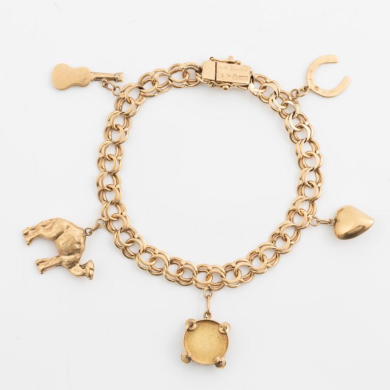 Armband 18K guld bismarcklänk, med berlocker.