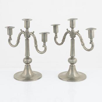 Edvin Ollers, a pair of pewter candelabra, Stockholm, 1922.
