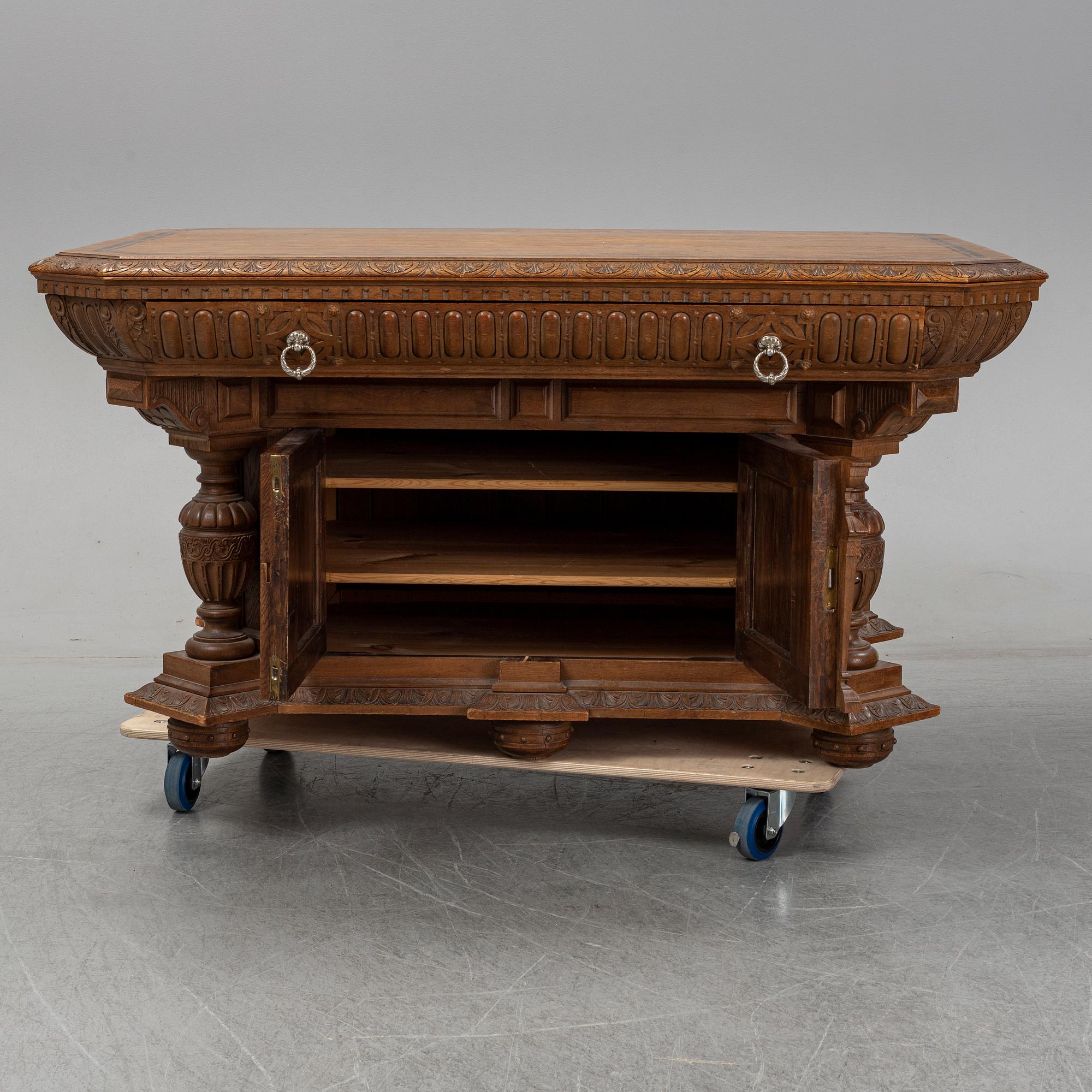 An oak library table, 1890's.