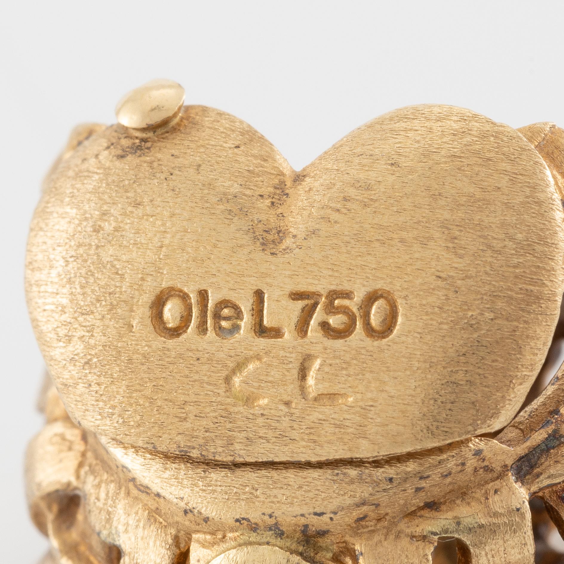 Ole Lynggard lås i form av ett hjärta 18K guld med runda briljantslipade diamanter.