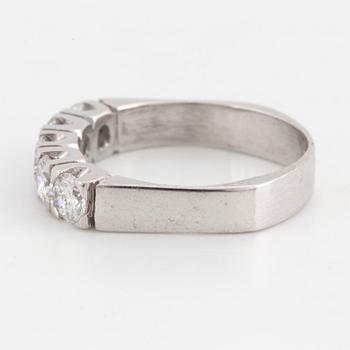 A half-eternity 18K white gold diamond ring.