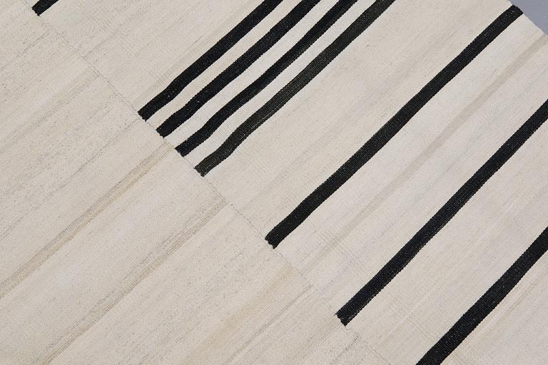 A carpet, Kilim, ca 315 x 225 cm.