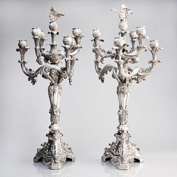 A pair of Swedish mid 19th century silver candelabra, marks of Gustaf Möllenborg, Stockholm 1844.