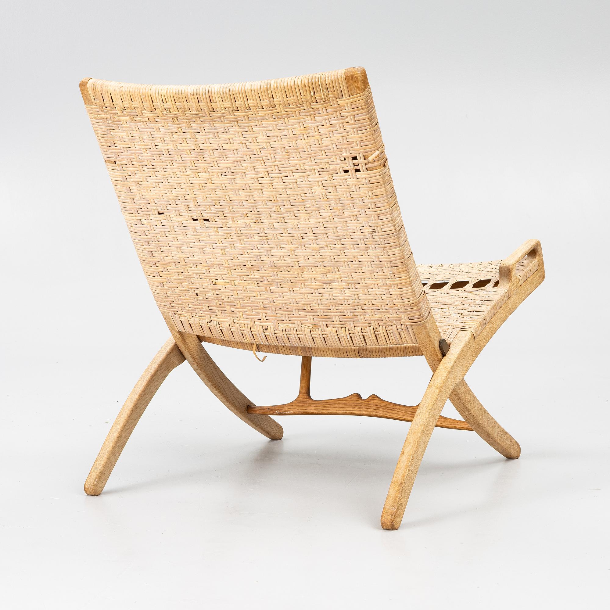 Hans J. Wegner, A folding chair, JH 512, Johannes Hansen, Denmark.