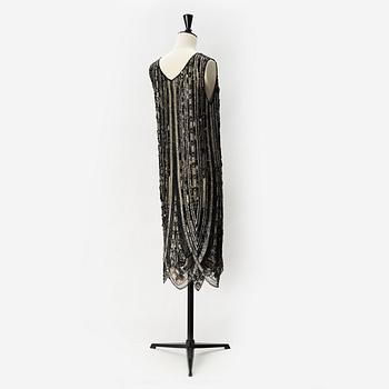 A sequin and pearl-embroidered 1920's dress.