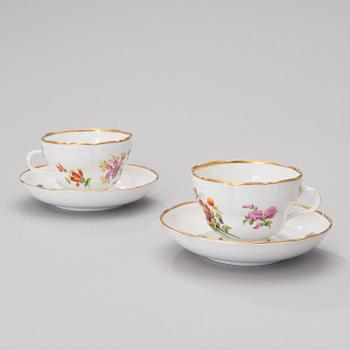 A pair of 19th century porcelain coffee cups, KPM Berlin 1849-1870.