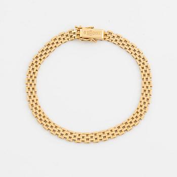 18K gold bracelet.