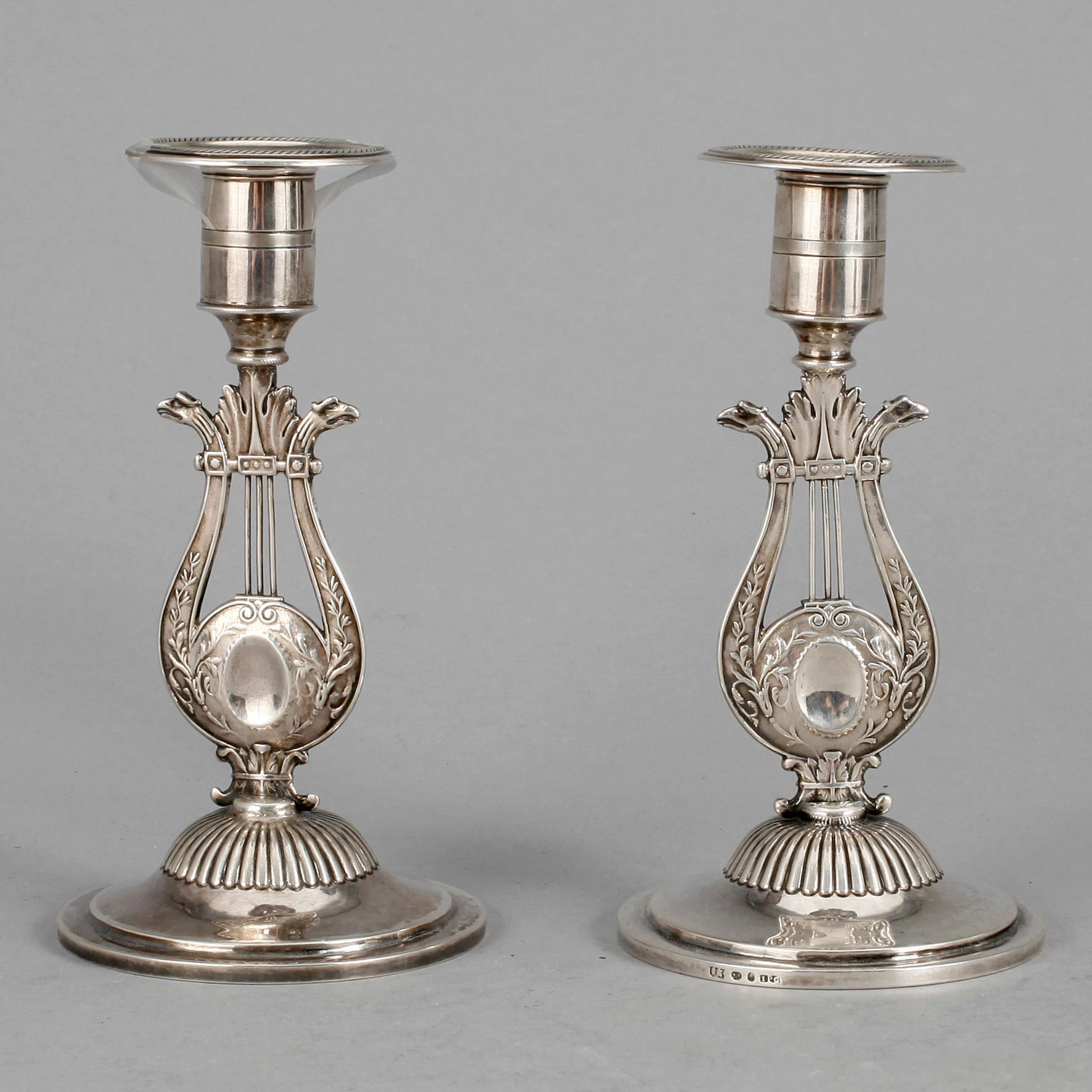 LJUSSTAKAR, ett par, silver, empire, Johan Petter Grönvall, Stockholm 1826. Tot ca 308 gram.