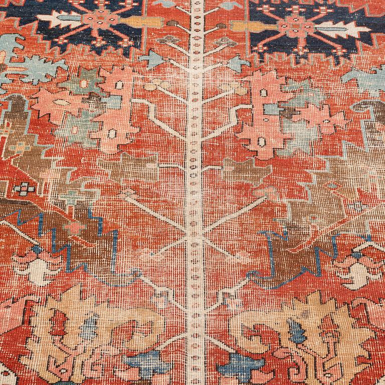 A antique Heriz carpet, ca 384 x 275 - 290 cm.