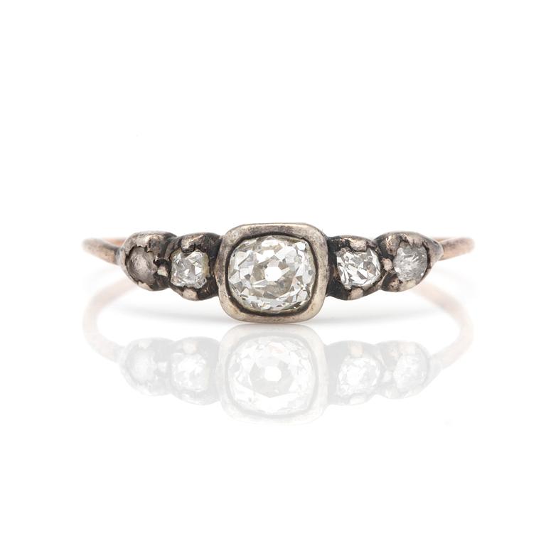 A ring with old-cut diamonds.