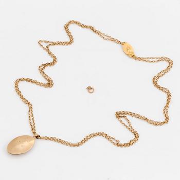 A chain and locket with hairwork.