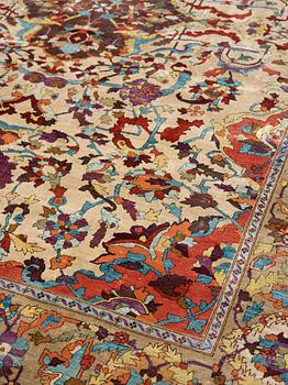 A RUG. An antique silk Kashan so called Motachem. 202,5 x 136,5 cm.