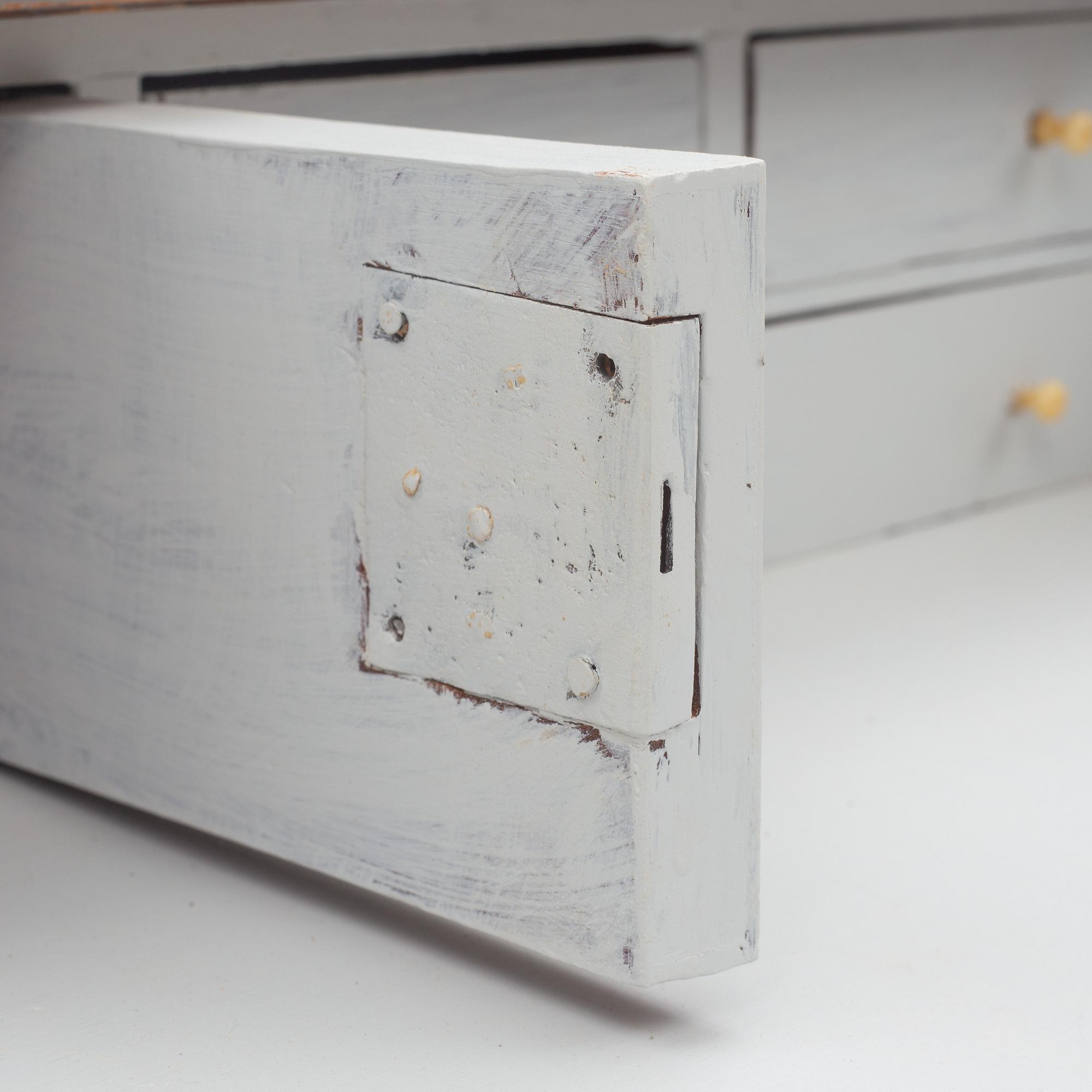 A Gustavian style chest of drawers, early 20th century.