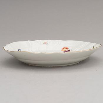 Two Meissen porcelain vases, a platter, an urn and a lidded box from the latter half of 20th century.