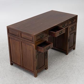 A Chinese hardwood desk, 20th century.