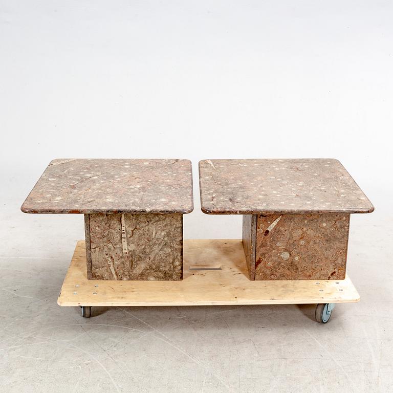 A set of two stone side tables later part of the 20th century.