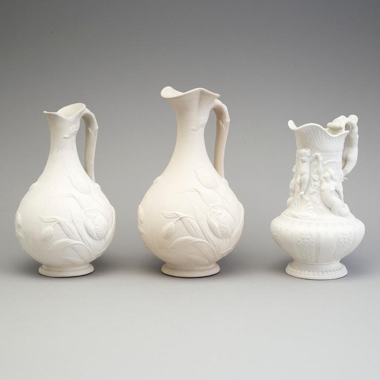 FIVE SIMILAR PARIAN JUGS, Gustafsberg, second half of the 19th century.