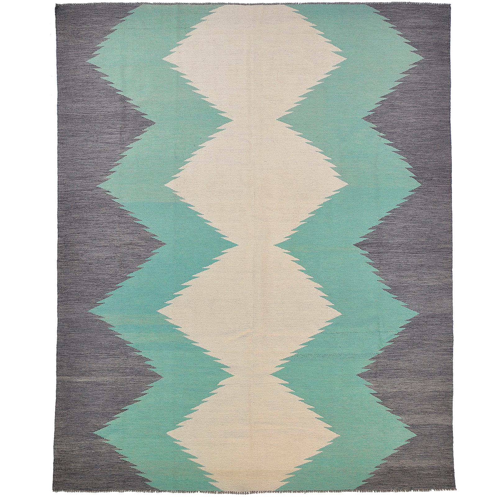 A kilim carpet, ca 303 x 250 cm.