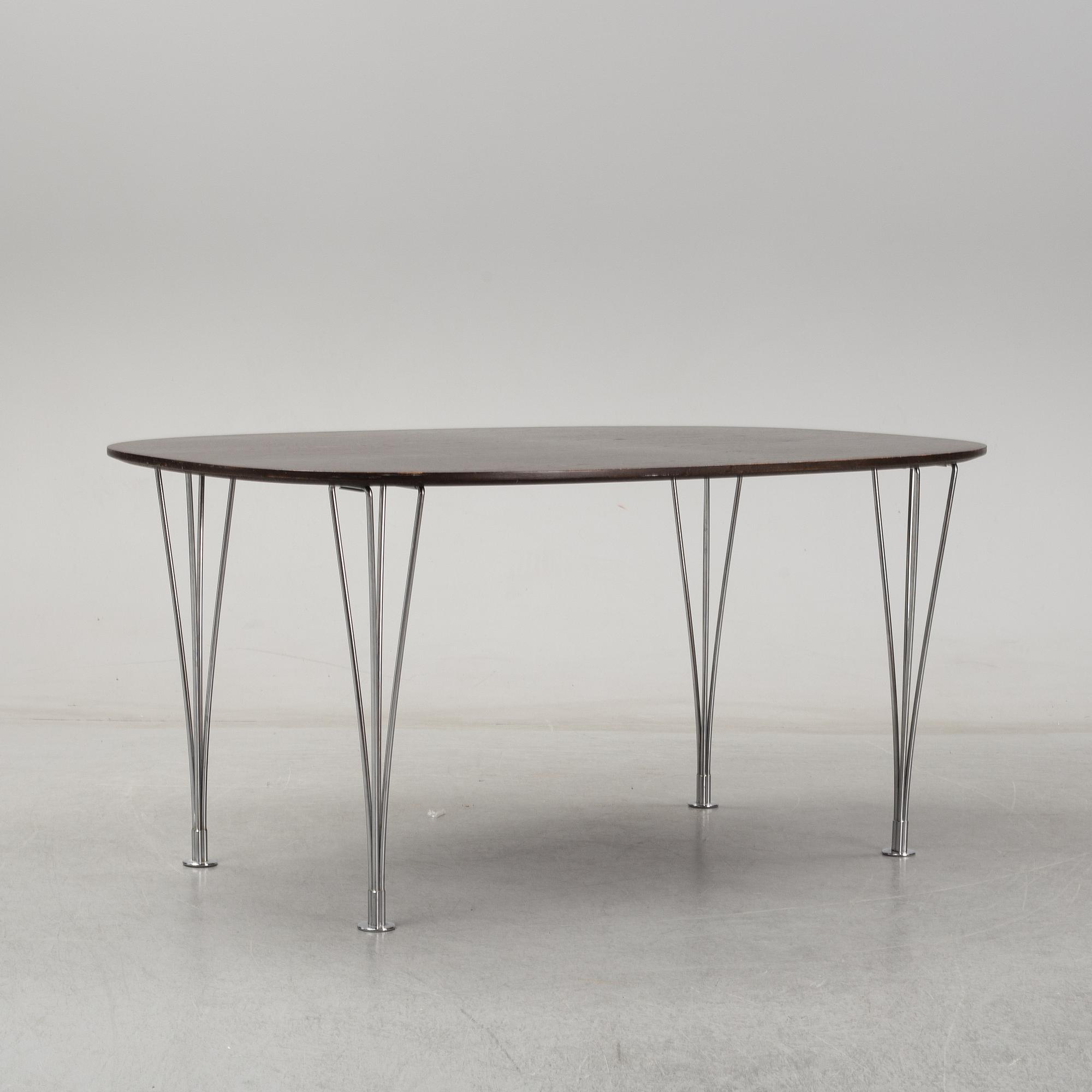 A 'Super-elliptical table by Piet Hein & Bruno Mathsson for Fritz Hansen.