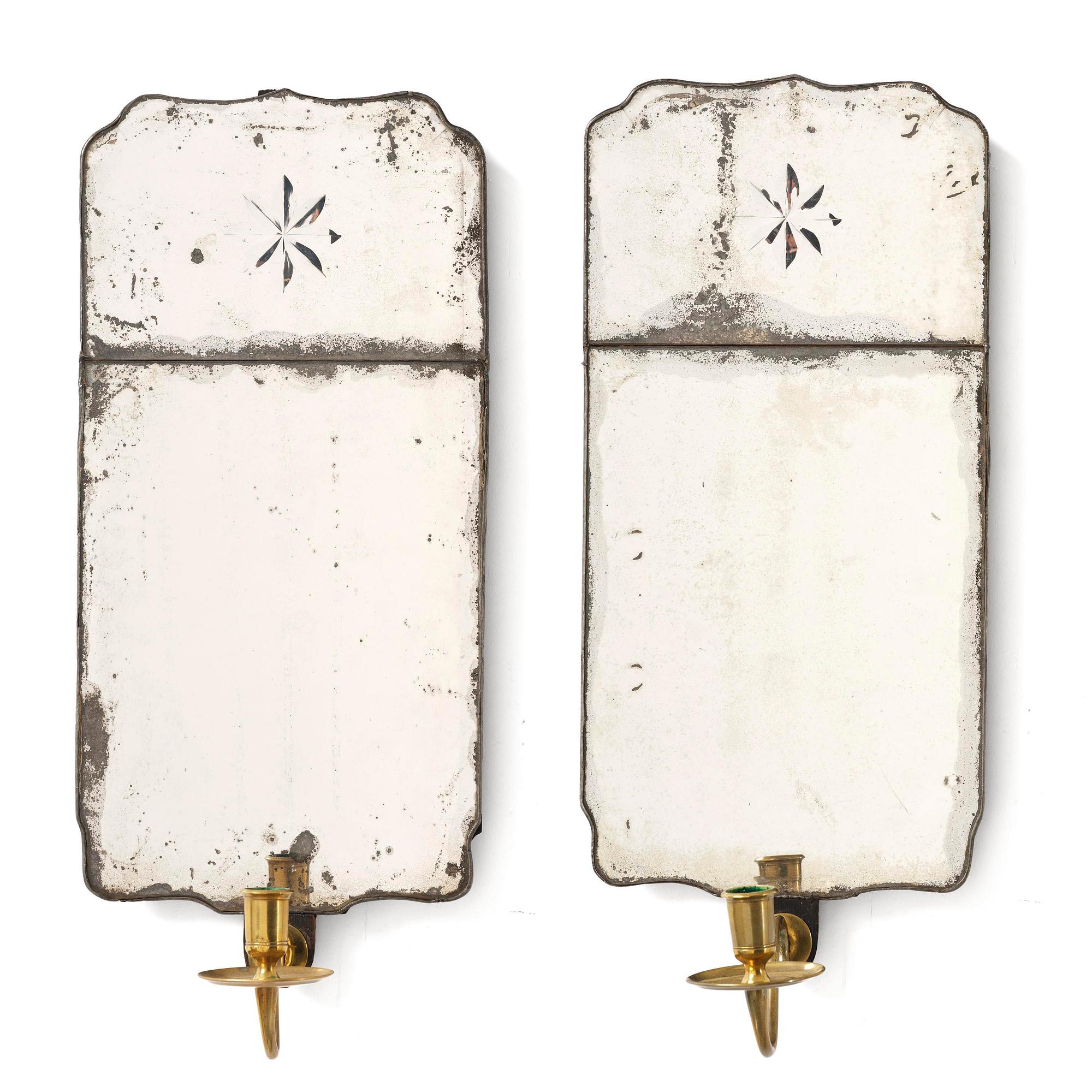 A pair of Gustavian engraved glass one-branch girandole mirrors by N. Meunier (master in Stockholm 1754-97).