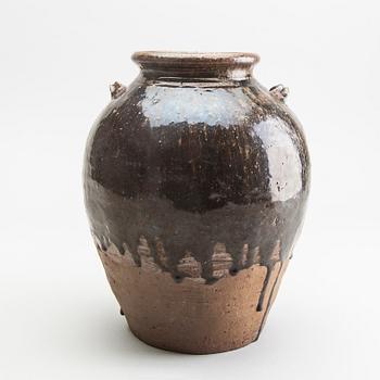 A South East Asian brown and black glazed jar, 14th/17th Century.