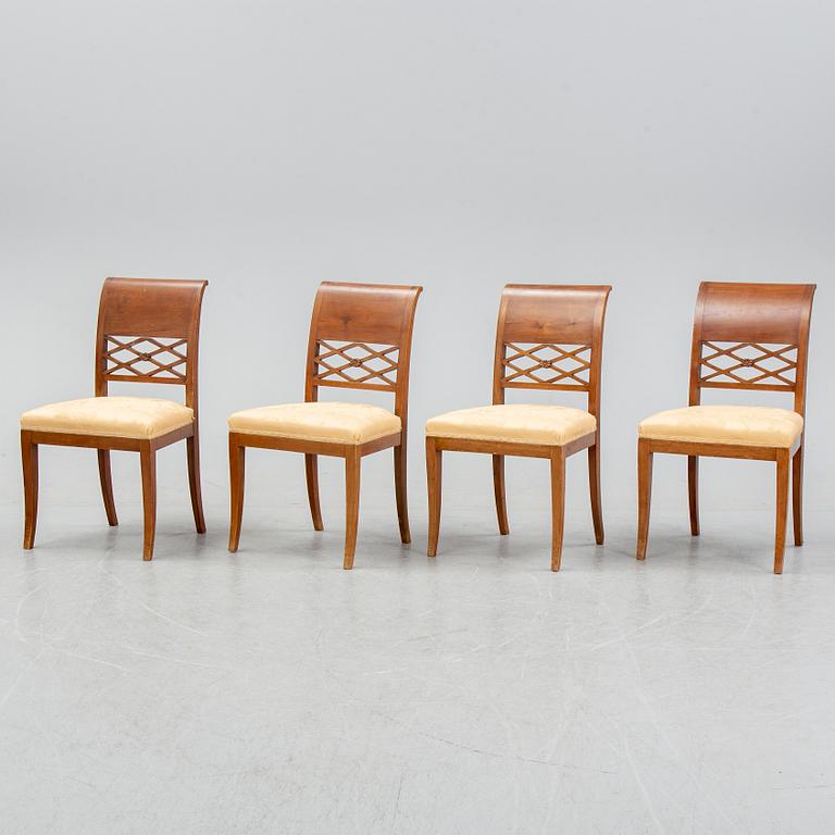 A set of four empire style mahogany chairs, first half of the 20th Century.