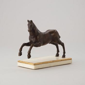 A Baroque 17th century bronze figure of a horse.