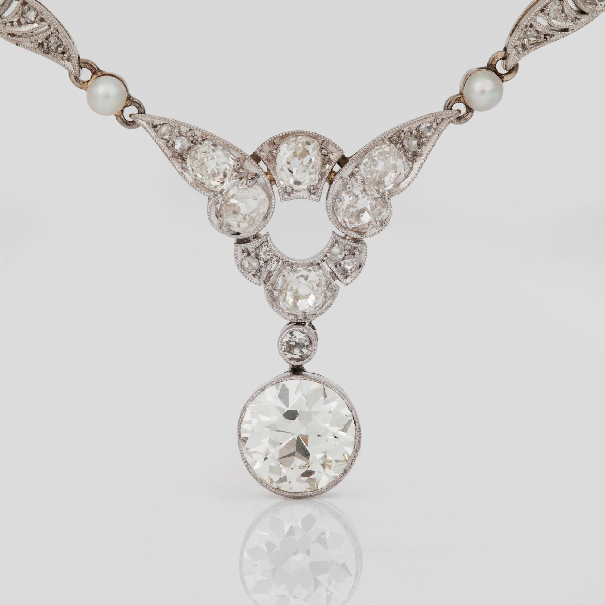 COLLIER med gammalslipade diamanter och pärlor, 1910-tal.