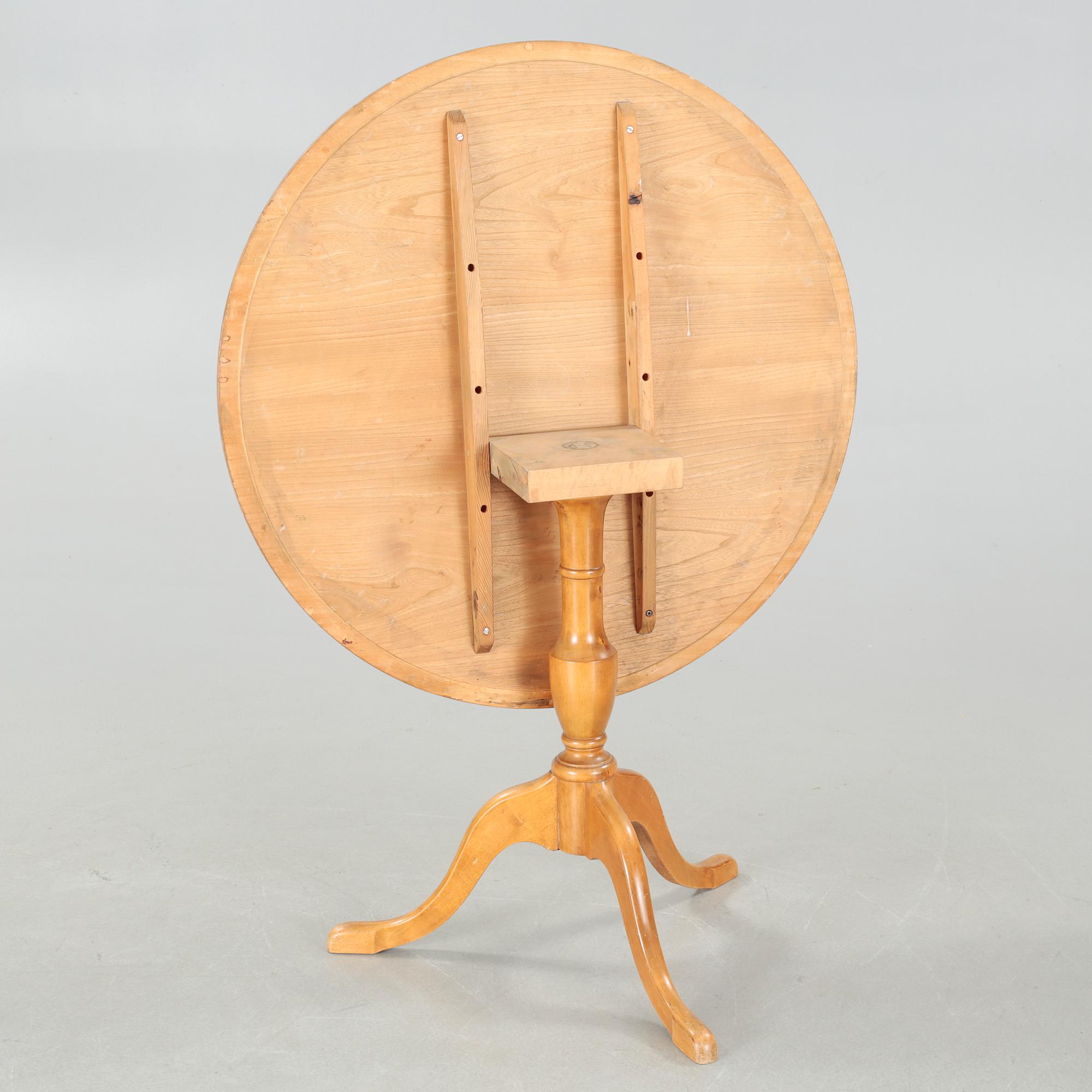 A folding table, made in the first half of the 20th century.