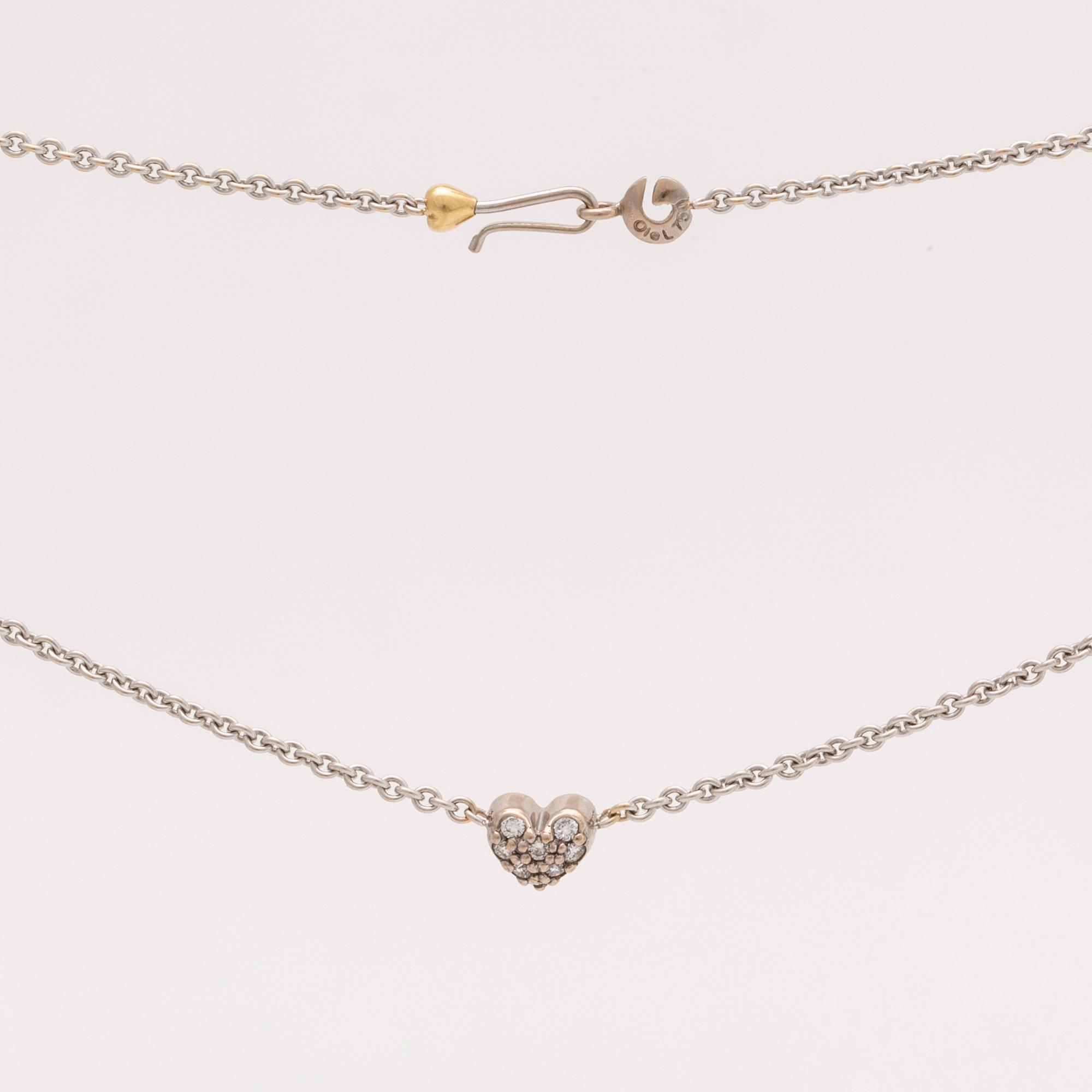 Lynggaard pendant on cjain, 18k whitegold brilliant-cut diamonds 0,08 ct, width heart approx 5 mm, length 40 cm, dustbag.
