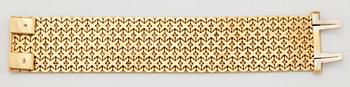 An 18K gold Tännler bracelet.