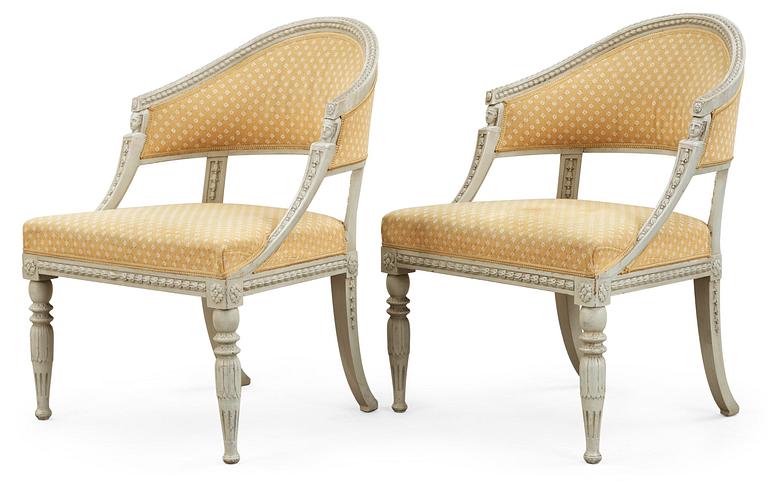 A pair of late Gustavian early 19th century armchairs.