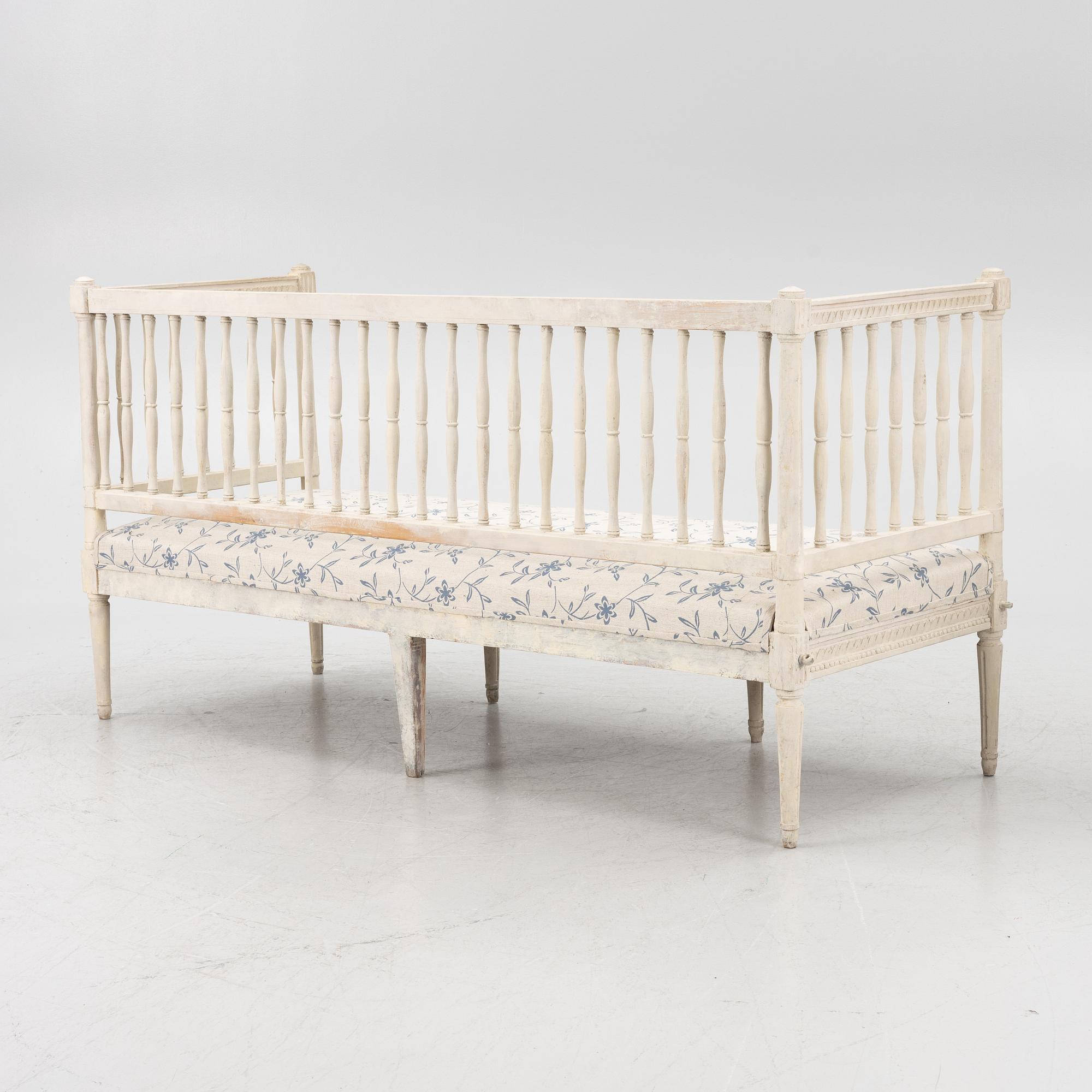 A Gustavian style painted sofa, 19th Century.