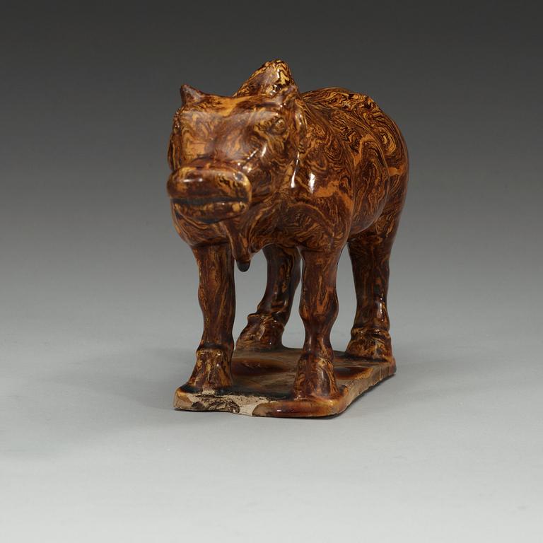 A marbled pottery figure of an ox, presumably Ming dynasty.
