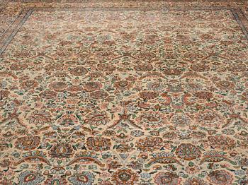 A carpet, a semi-antique Kerman, ca 510,5-513 x 315-318,5 cm.